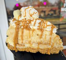 Load image into Gallery viewer, Peanut Butter Polar Bear (White Reese) Cheesecake Slice
